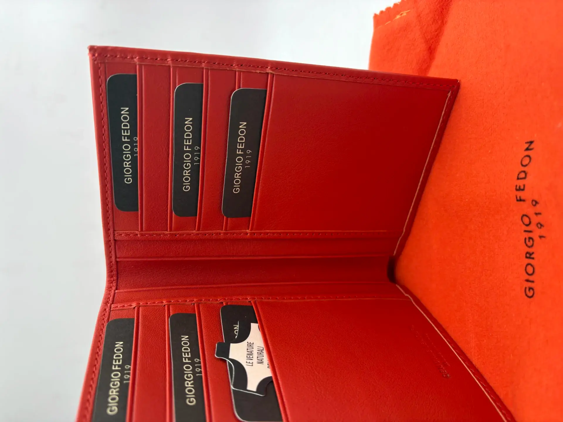 ORANGE PASSPORT HOLDER